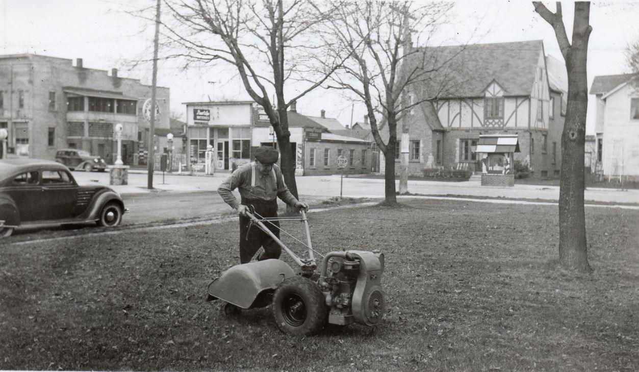 vintage photo of Henry using a tiller